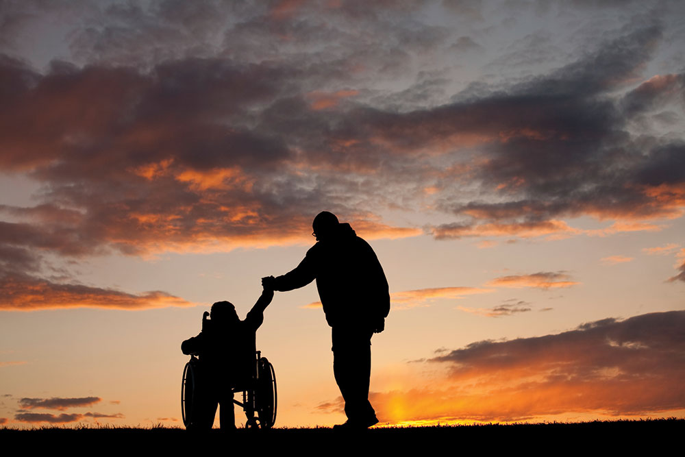 travel_23721354_father_and_child_wheelchair_1000x667